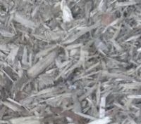 Woodchips produced typically from recycled timber via a shredder - note the tendency towards long splinter like pieces